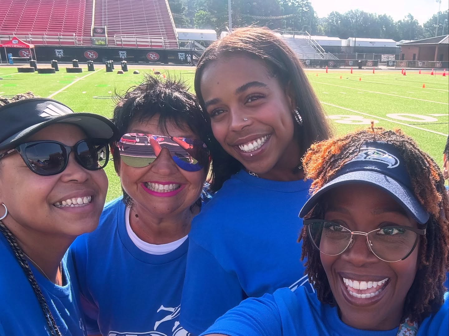 TG31 volunteer team on the football field