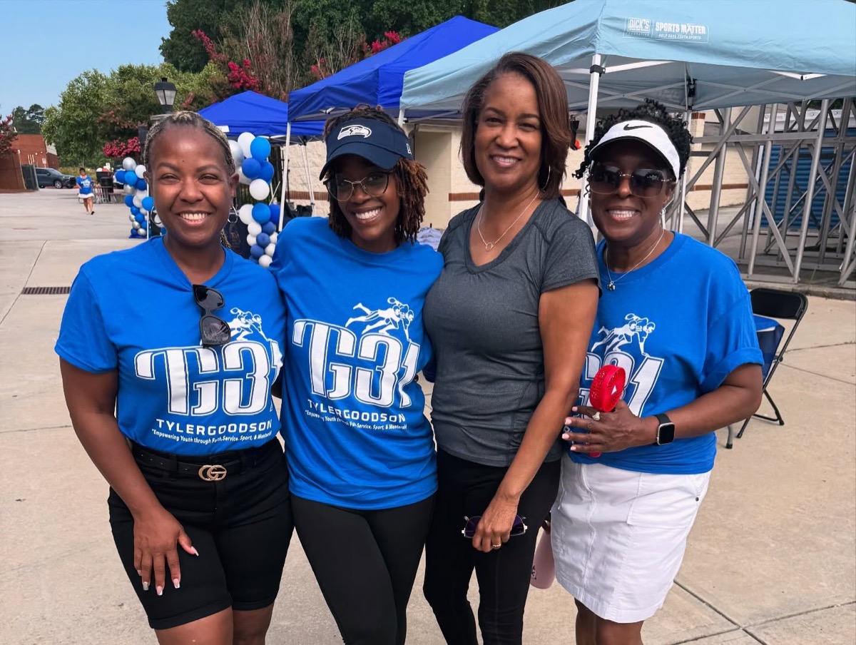 Volunteers in TG31 shirts at camp